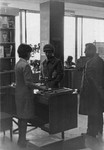 Петухова Алевтина Афанасьев­на, директор магазина «Книжный мир», за работой